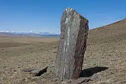 Стела на склоне