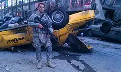 Старший сержант Майкл Т. Лэндис на съёмках в Кливленде