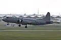 Взлет патрульного самолета P-3C Orion с авиабазы Кадена. 31 декабря 2009