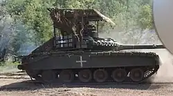 Украинский танк Т-80БВ с верхней защитной решёткой. 2024 год