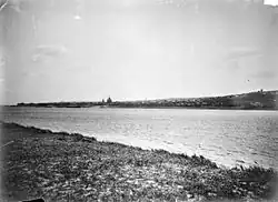 Вид на город и протоку Воложку с затопленного ныне острова Сосновый, 1894 год