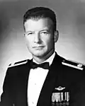 A black-and-white photo of an older white man in his military dress uniform