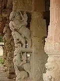 Pillars with Yali and Kudure Gombe ("horse doll") at Ranganatha temple, Rangasthala, Chikkaballapur district, Karnataka state, India